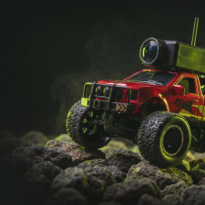 MiniRC FPV monster pickup crawling over rocks